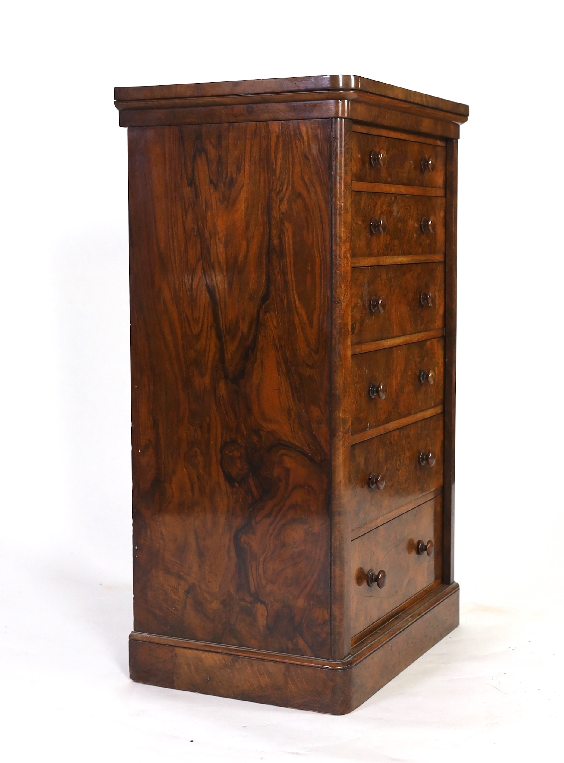 A Victorian walnut Wellington chest, retailed by Toplis & Son, Berners Street, London, width 62cm, depth 43cm, height 102cm